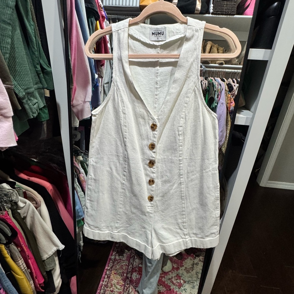 Show Me Your MuMu White Sleeveless Jumpsuit with V-Neckline